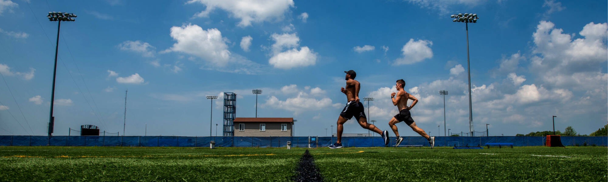 “Sitting for three months has not been good to my body,” said Andrew Borja, left, as he runs sprints with Thomas Bruni, right, as they do some conditioning on July 9, 2020 at Grand Valley State University. The two are both students who run for Cros...